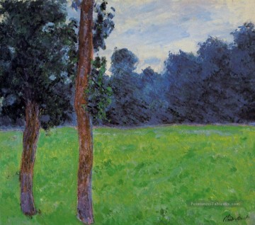 Deux arbres dans une prairie Claude Monet Peinture à l'huile